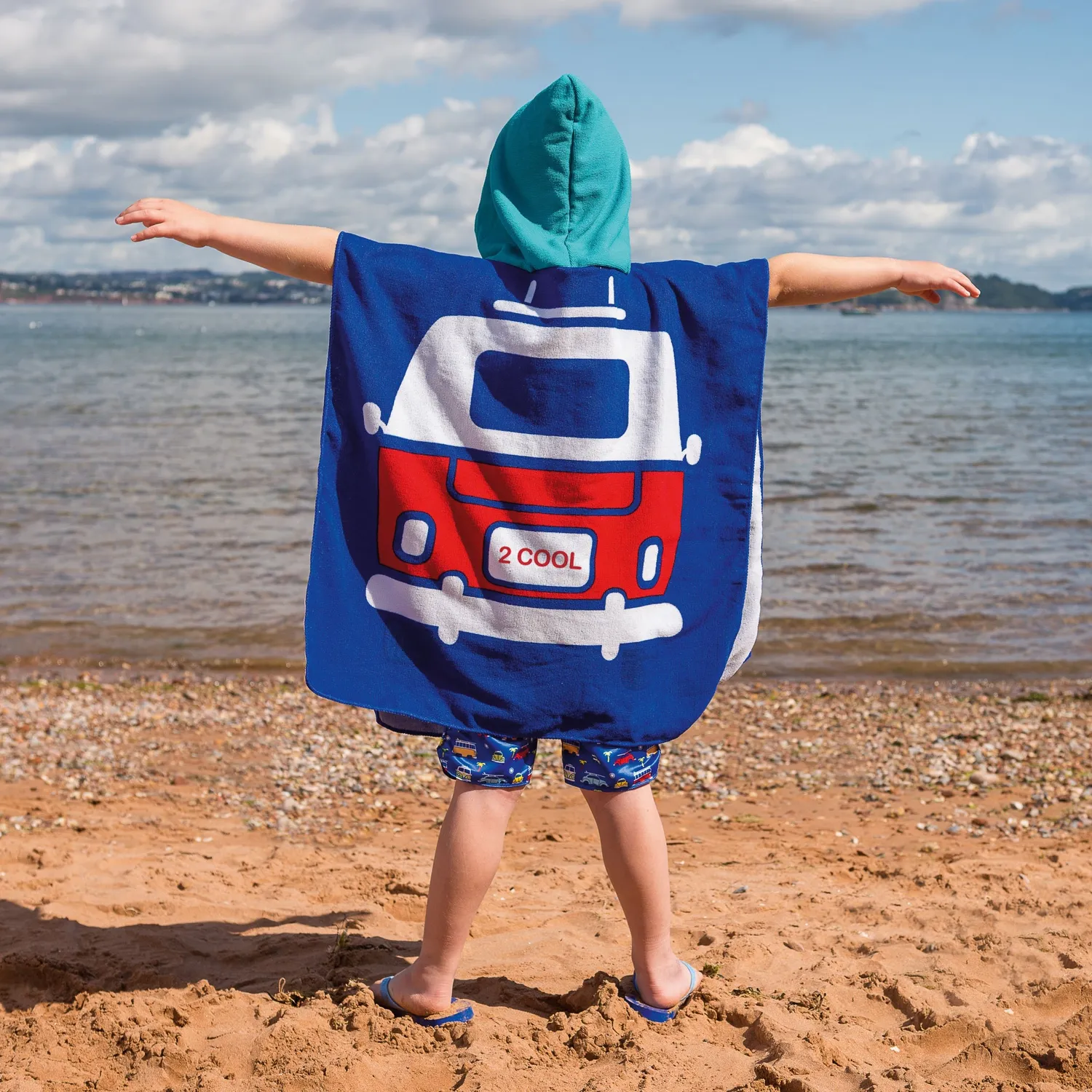 Brisa Volkswagen poncho enfant bleu à capuche